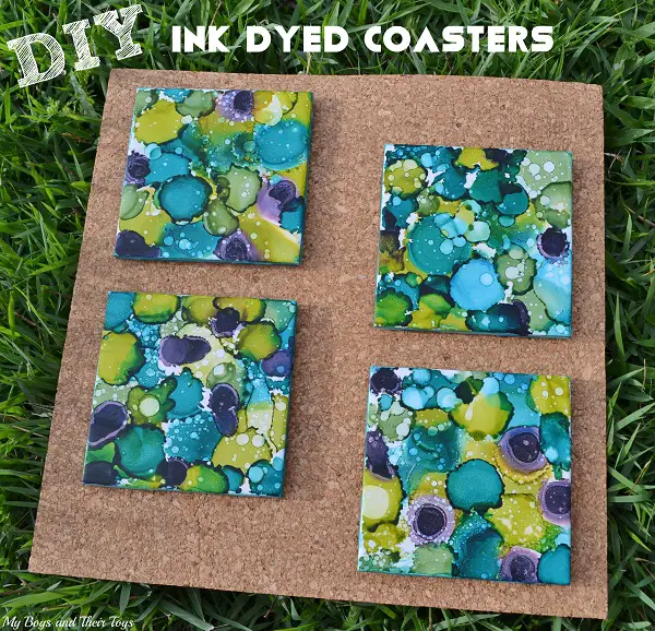 DIY Alcohol Ink Dyed Coasters on corkboard