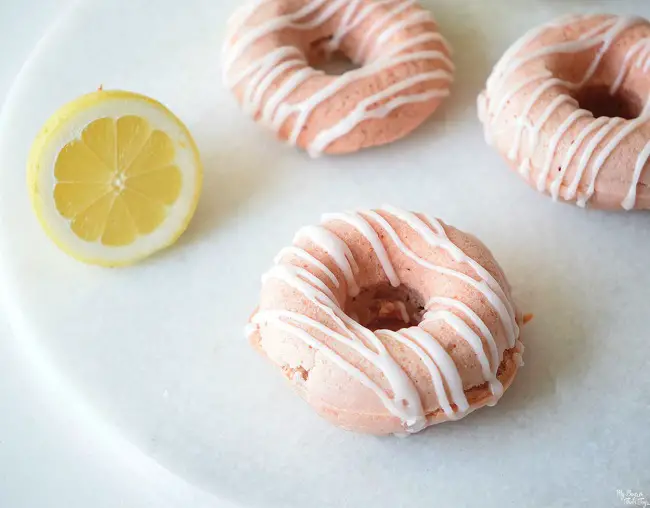 Strawberry Lemonade Donuts with glaze and half a lemon