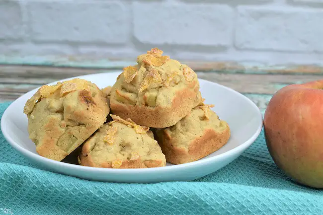 easy apple cinnamon muffins on white plate with apple