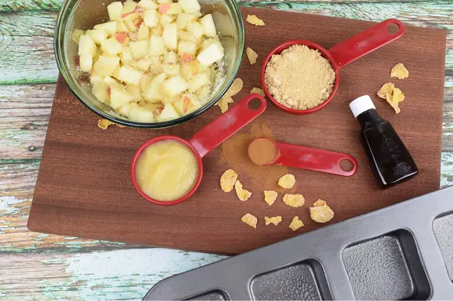 muffins ingredients diced apples in bowl, baking pan