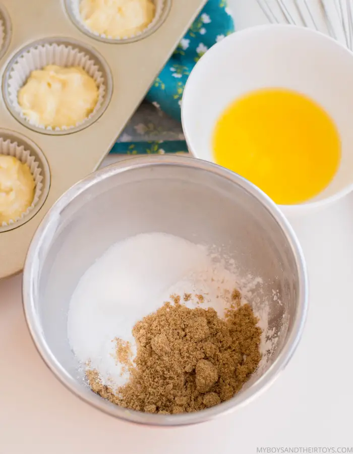 lemon muffins crumble sugar and brown sugar in a bowl, egg in a bowl