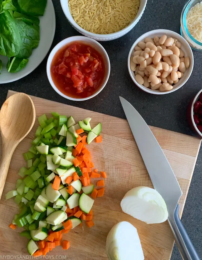 Orzo Minestrone Soup cutting board with ingredients